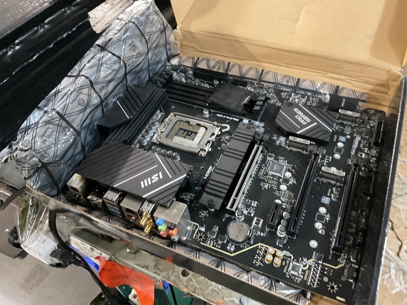 Photo 1 of ***DAMAGED - SEE NOTES/PICTURES***MSI PRO Z790-P WiFi ProSeries Motherboard (Supports 12th/13th/14th Gen Intel Processors, LGA 1700, DDR5, PCIe 5.0, M.2, 2.5Gbps LAN, USB 3.2 Gen2, HDMI/DP, Wi-Fi 6E, Bluetooth 5.3, ATX) (Renewed)