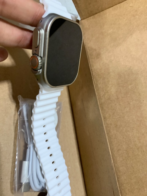 Photo 1 of Apple Watch Ultra 2 [GPS + Cellular 49mm] Smartwatch with Rugged Titanium Case & White Ocean Band. Fitness Tracker, Precision GPS, Action Button, Extra-Long Battery Life, Bright Retina Display
