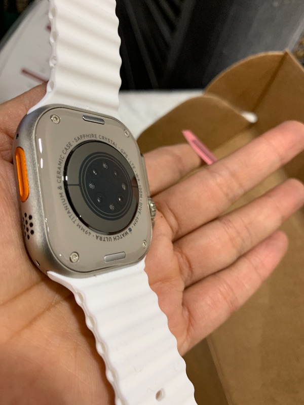 Photo 1 of Apple Watch Ultra 2 [GPS + Cellular 49mm] Smartwatch with Rugged Titanium Case & White Ocean Band. Fitness Tracker, Precision GPS, Action Button, Extra-Long Battery Life, Bright Retina Display