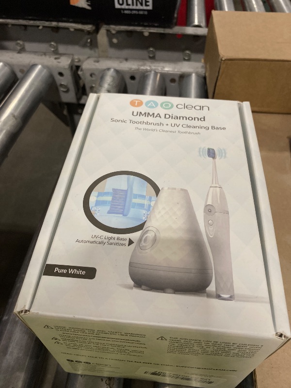 Photo 1 of Tao Clean Sonic Toothbrush and Cleaning Station - White