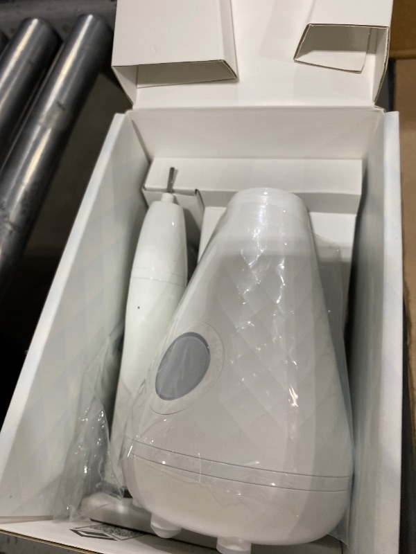 Photo 1 of Tao Clean Sonic Toothbrush and Cleaning Station - White