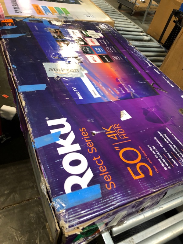 Photo 1 of ****DAMAGED*** Roku Smart TV – 50-Inch Select Series, 4K HDR TV – Roku TV with Roku Remote – Flat Screen LED Television with Wi-Fi for Streaming Live Local News, Sports, Family Entertainment