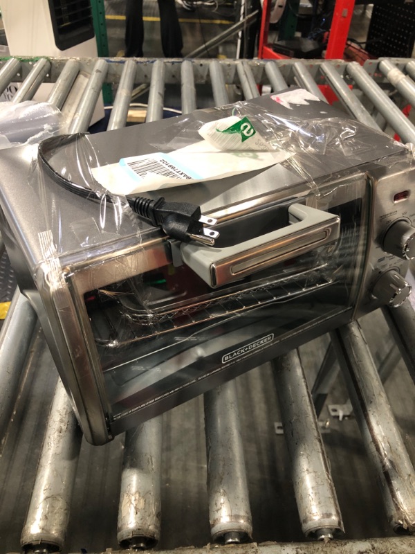 Photo 1 of ****DENTED- Sold for Parts - Final Sale***BLACK+DECKER 4-Slice Air Fry Toaster Oven, 5-in-1 Countertop Oven
