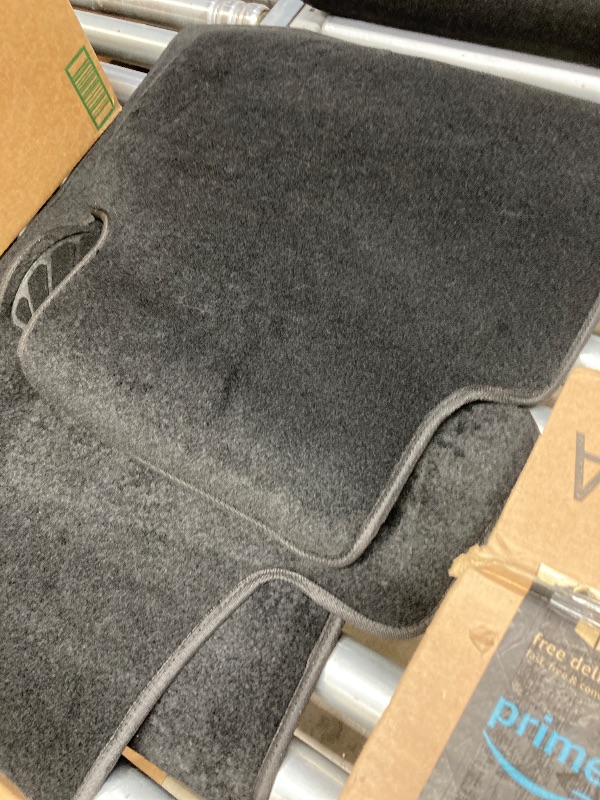 Photo 1 of **Black 4-Piece Car Floor Mats**