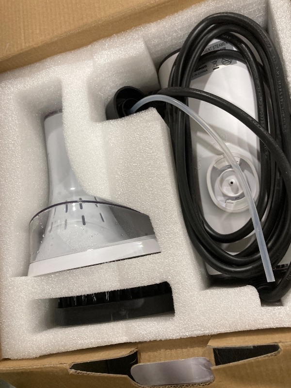 Photo 1 of NovaSteam Vacuum Garment Steamer White