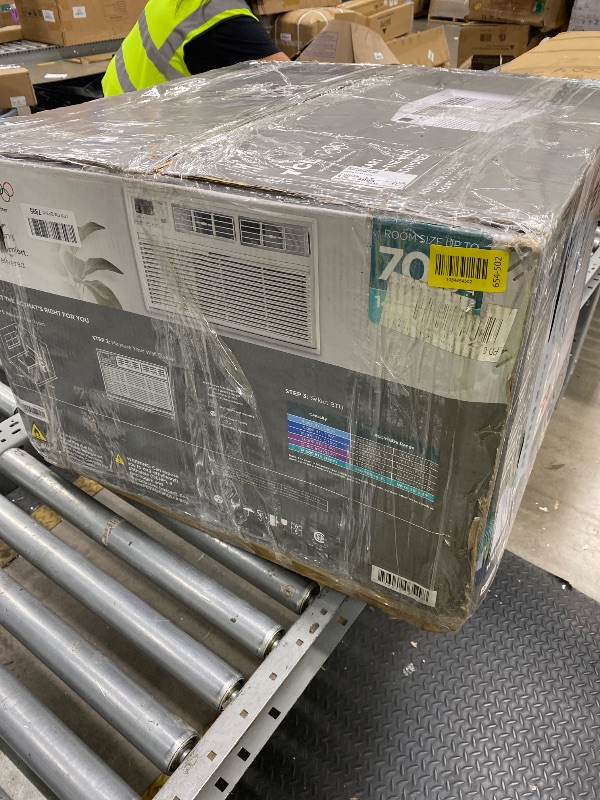 Photo 1 of *Minor damage* TCL 14,000 BTU Smart Through-the-Wall Air Conditioner, 230V, Wi-Fi