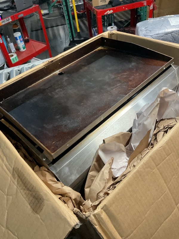 View 3 of *** PARTS ONLY GRIDDLE IS VERY HEAVILY USED, UNABLE TO TEST A FUNCTIONAL***
GRILLS 3-Burner Tabletop Gas Griddle (Silver)LPNPMFS0007232