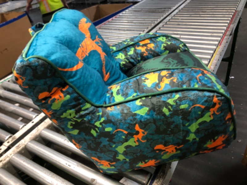 Photo 1 of ***DAMAGED - SEE NOTES/PICTURES*** Idea Nuova Jurassic World Dinosaur Bean Bag Chair,Blue 18” x 18” Nylon Chair with Piping and Top Carry Handle, Lightweight & Portable Seating for Kids Room