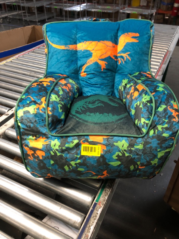 Photo 1 of ***DAMAGED - SEE NOTES/PICTURES*** Idea Nuova Jurassic World Dinosaur Bean Bag Chair,Blue 18” x 18” Nylon Chair with Piping and Top Carry Handle, Lightweight & Portable Seating for Kids Room