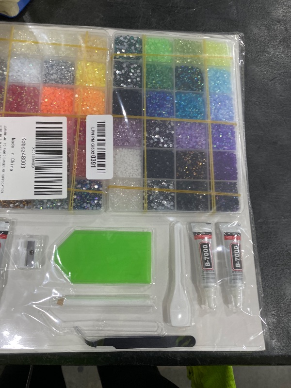 Photo 1 of KUIEKON 48000Pcs 48 Colors Resin Rhinestones Bedazzling Kit,3mm Nail Gems