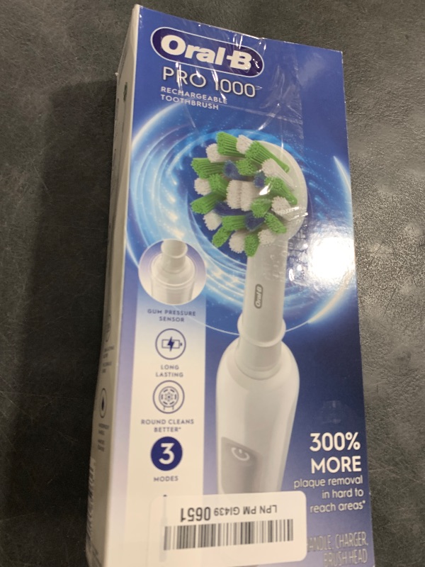 Photo 1 of Oral-B Pro 1000 Rechargeable Electric Toothbrush, White
