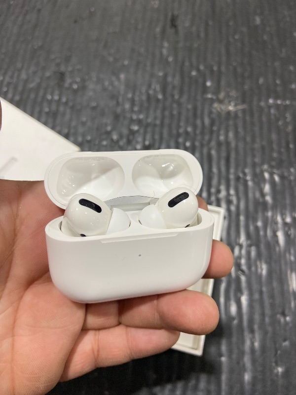 Photo 1 of NON-FUNCTIONAL, PARTS ONLY-------------------------Apple AirPods Pro (1st Generation) with MagSafe Charging Case