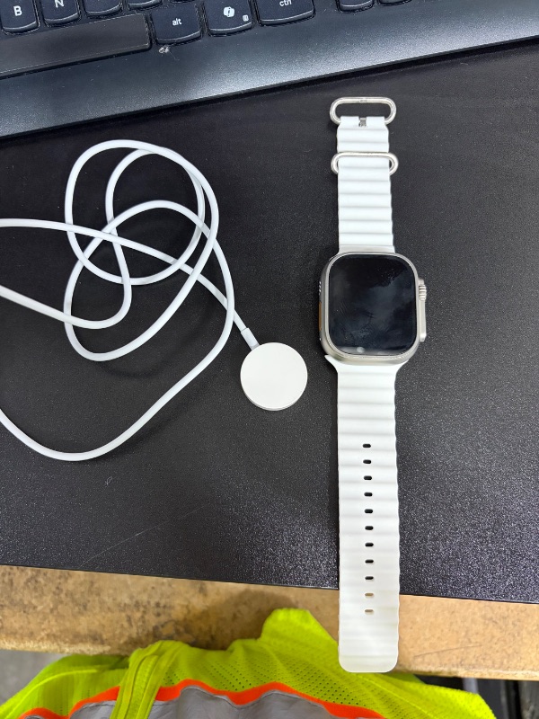 Photo 1 of Apple Watch Ultra 2 [GPS + Cellular 49mm] Smartwatch with Rugged Titanium Case & White Ocean Band. Fitness Tracker, Precision GPS, Action Button, Extra-Long Battery Life, Bright Retina Display