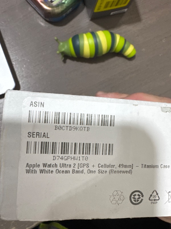 Photo 1 of Apple Watch Ultra 2 [GPS + Cellular 49mm] Smartwatch with Rugged Titanium Case & White Ocean Band. Fitness Tracker, Precision GPS, Action Button, Extra-Long Battery Life, Bright Retina Display