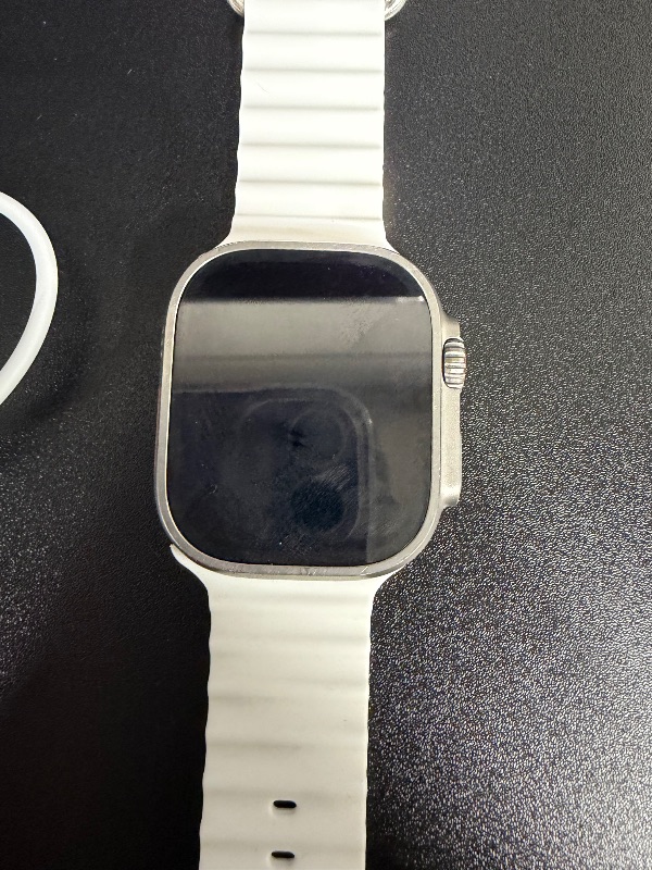 Photo 1 of Apple Watch Ultra 2 [GPS + Cellular 49mm] Smartwatch with Rugged Titanium Case & White Ocean Band. Fitness Tracker, Precision GPS, Action Button, Extra-Long Battery Life, Bright Retina Display