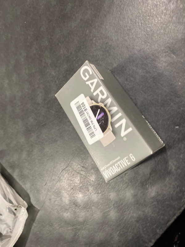 Photo 1 of Garmin vívoactive 6 Smartwatch Lunar Gold/Bone 42mm