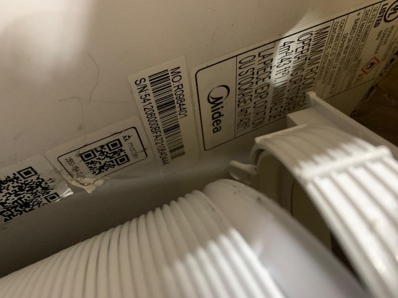 Photo 1 of Midea 10,000 BTU Portable Air Conditioner, White