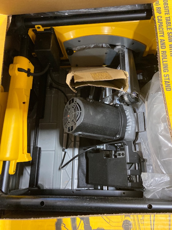 Photo 1 of DEWALT 10" Table Saw with Rolling Stand, 15 Amp, 32-1/2" Rip Capacity
