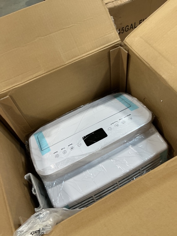 Photo 1 of ***MISSING PIECES*** NOT WORKING PROPERLY*** SereneLife Portable AC Unit and Heater, Adjustable Temperature with 12,000 BTU Cooling & Heating, Smart Wi-Fi Control, Dehumidifier & Fan Modes, Portable AC Units for Rooms with Window Mount Kit White