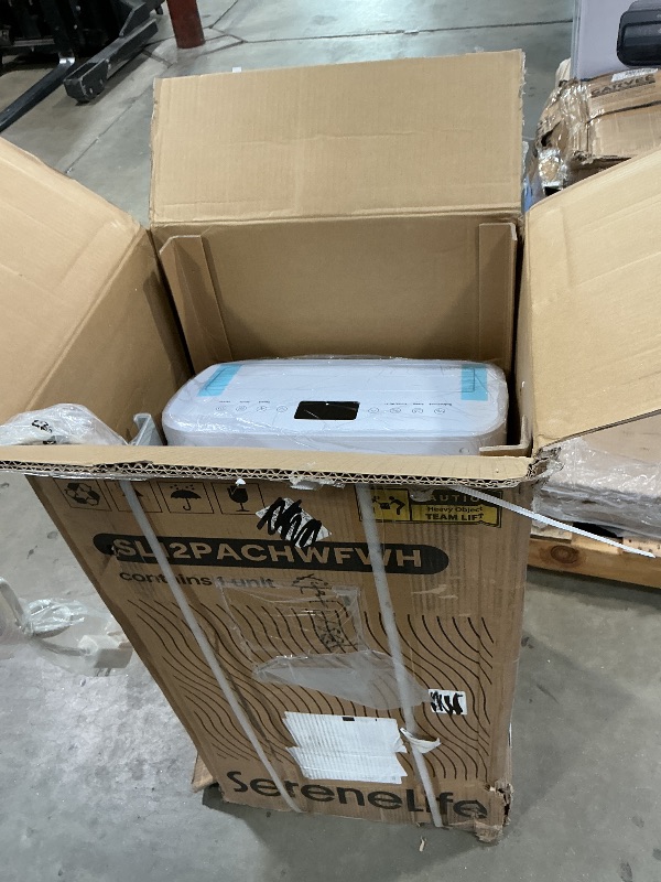 Photo 1 of ***MISSING PIECES*** NOT WORKING PROPERLY*** SereneLife Portable AC Unit and Heater, Adjustable Temperature with 12,000 BTU Cooling & Heating, Smart Wi-Fi Control, Dehumidifier & Fan Modes, Portable AC Units for Rooms with Window Mount Kit White