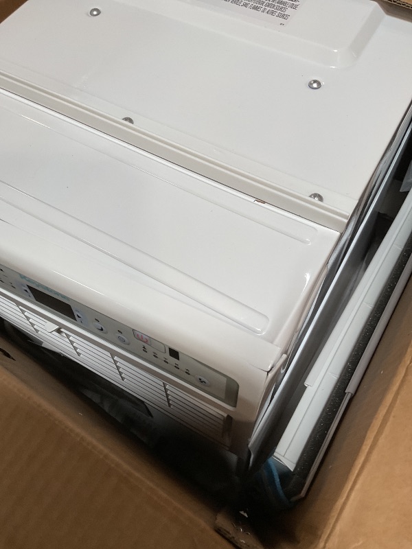 Photo 1 of ** front face plate is cracked/loose** Keystone 10,000 BTU Slider Window Air Conditioner and Dehumidifier, 115V Air Conditioner Window Unit for Bedroom, Living Room, and Small-Medium Sized Rooms up to 450 Sq.Ft, 4-Way Air Direction Control