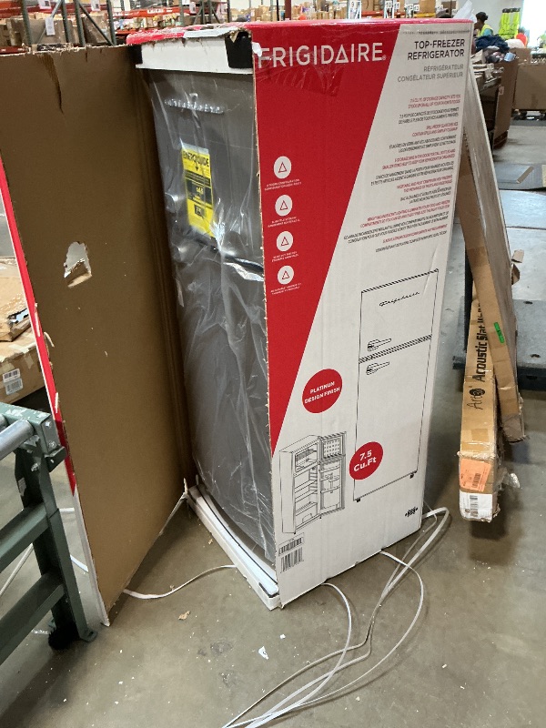 Photo 1 of *** MAJOR DENT ON FRONT***Frigidaire, 2 Door Apartment Size Refrigerator/Freezer Combo, 7.5 cu ft, Platinum Series, Stainless, 23" D x 21.5" W x 55.5" H