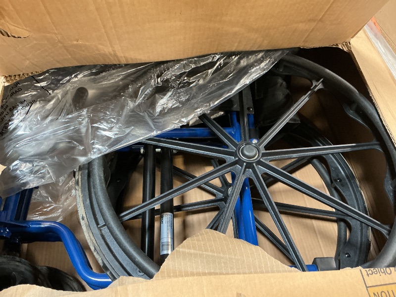 Photo 1 of ***USED***Drive Medical Blue Streak Lightweight Foldable Wheelchair - Enhanced Mobility Support - Durable Construction - Padded Comfort - Swing-Away Leg Rests - Desk Arms - Blue/Black - 18 Inch Seat