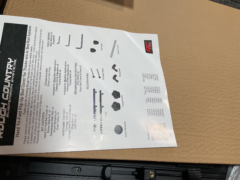 Photo 1 of ** missing seal strip **Rough Country Hard Tri-Fold Truck Bed Tonneau Cover for Ford F-150 (2021-26), Lightning (2022-26) - Aluminum Flip-Up Folding Bed Cover, Fits 5'7" (66.7") Bed