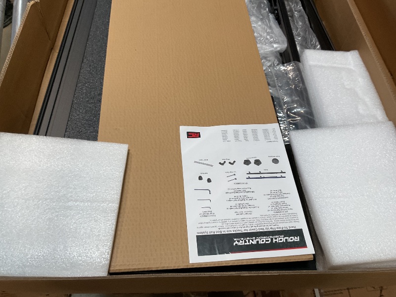 Photo 1 of ** missing seal strip **Rough Country Hard Tri-Fold Truck Bed Tonneau Cover for Ford F-150 (2021-26), Lightning (2022-26) - Aluminum Flip-Up Folding Bed Cover, Fits 5'7" (66.7") Bed