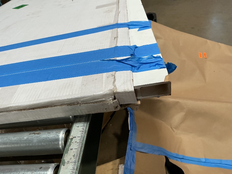 Photo 1 of *** MISSING HARDWARE AND MINOR SCRATCHES ***BarnSmith 36"x84" Concealed Sliding Barn Door, 2 Panel White Primed Hidden Barn Door with Soft Close Installation Hardware and Double Sided Pulls Included, Pre-Assembled Panel