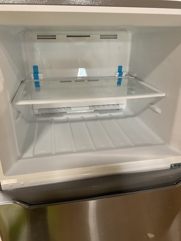 Photo 1 of ** dirt/scrapes/dented **KoolMore 30 Inch 20 Cu Ft Top Freezer Refrigerator, Stainless Steel, Freestanding Full Size Fridge Freezer for Home Kitchen or Garage