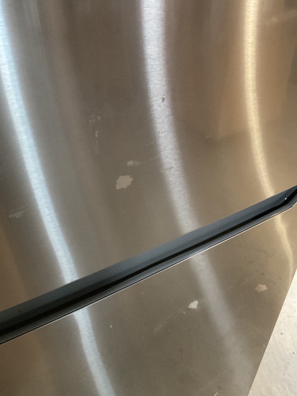 Photo 1 of ** dirt/scrapes/dented **KoolMore 30 Inch 20 Cu Ft Top Freezer Refrigerator, Stainless Steel, Freestanding Full Size Fridge Freezer for Home Kitchen or Garage