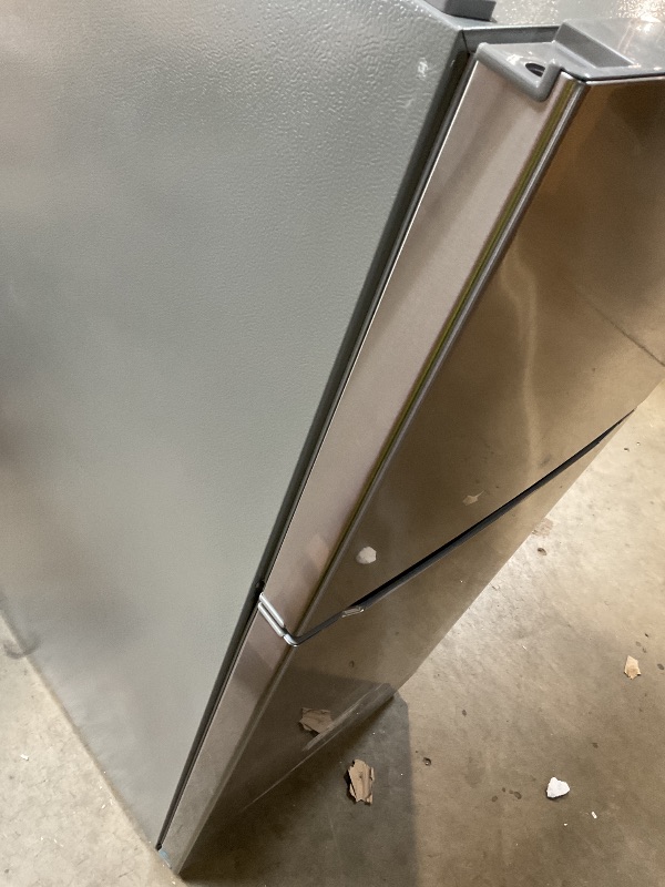Photo 1 of ** dirt/scrapes/dented **KoolMore 30 Inch 20 Cu Ft Top Freezer Refrigerator, Stainless Steel, Freestanding Full Size Fridge Freezer for Home Kitchen or Garage