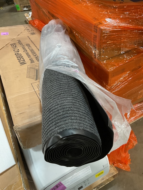Photo 1 of **UTILITY RUG BLACK/GRAY** 4’ WIDE, LENGTH UNKNOWN**