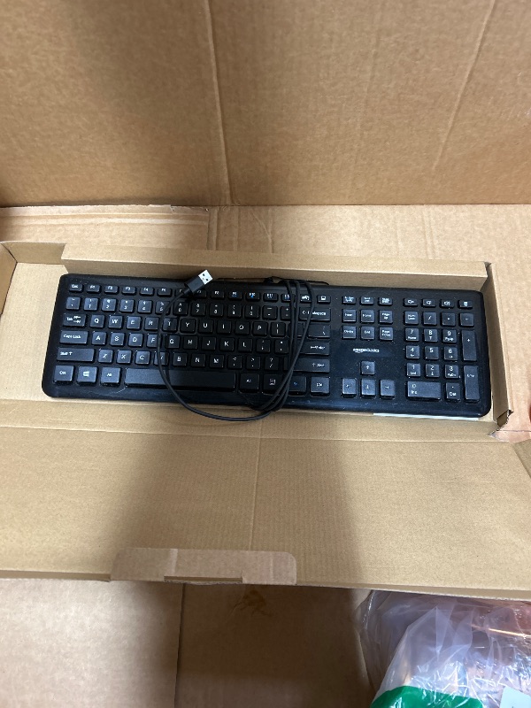 Photo 1 of **no mouse**  Amazon Basics Wired USB Keyboard and Mouse Combo, Full-Sized Keyboard with QWERTY Layout, Optical Tracking Mouse, Black