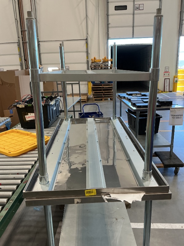 Photo 1 of large metal table