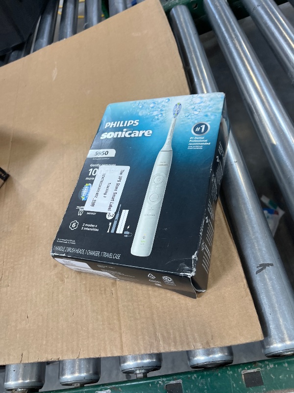 View 2 of Philips Sonicare 5950 Series Electric Toothbrush, with Pressure Sensor, for Sensitive Gums, 6 Brushing Settings, SmarTimer, BrushPacer, 21-Day Runtime, Travel Case, White, HX7130/03