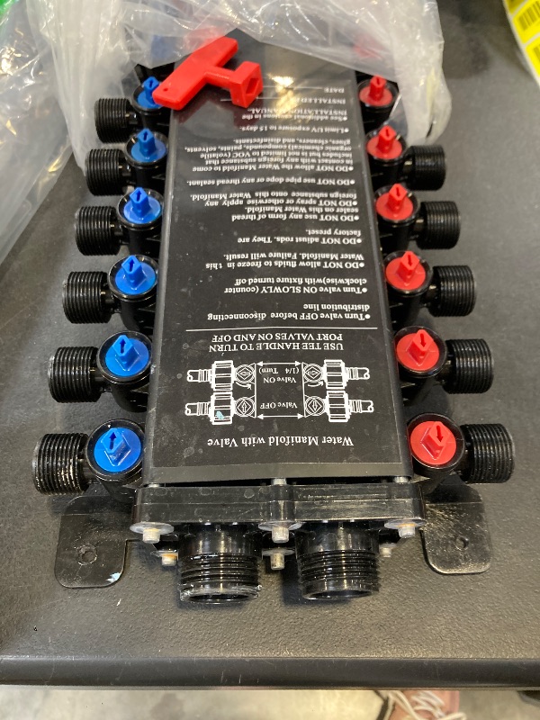 Photo 1 of water manifold with valves