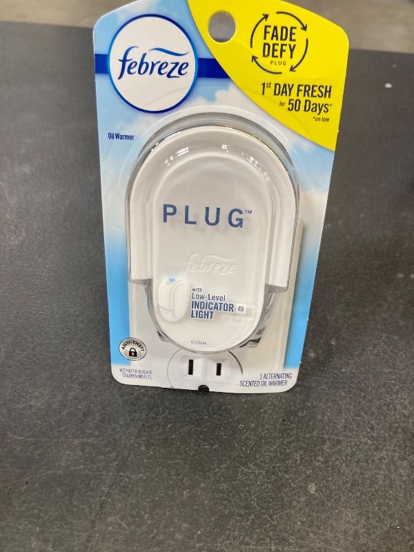 Photo 1 of Febreze Plug Starter Kit