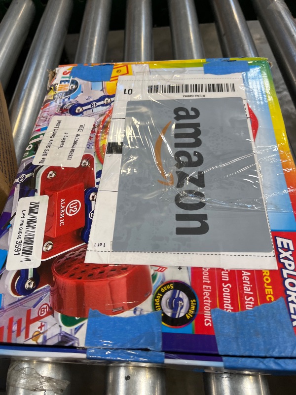Photo 1 of Snap Circuits Jr. SC-100 Electronics Exploration Kit, Over 100 Projects, Full Color Project Manual, 28 Parts, STEM Educational Toy for Kids 8 +