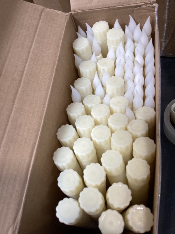Photo 1 of Treela 72 Pcs Flameless LED Taper Candles Battery Operated Candles Bulk 11 Inch Flickering Fake Candlesticks with Warm Light for Valentines Day Church Wedding Party Battery Not Included(Classic,Ivory)
