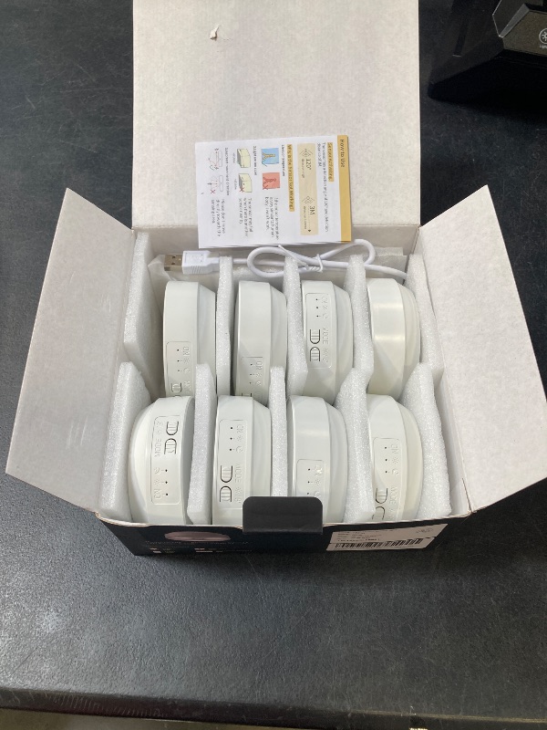Photo 1 of EZVALO 8 Pack Motion Sensor Closet Lights with Charging Station, 1200mAh Rechargeable LED Night Lights, Under Cabinet Lights, Puck Light, Dimmable, 3 Color Temps, Magnetic, Stick-On for Kitchen
