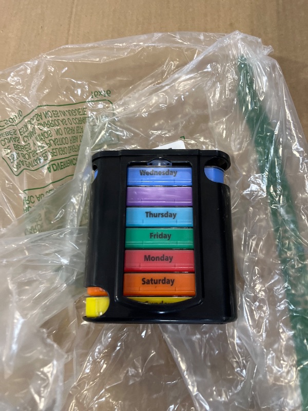 Photo 1 of pill dispenser
