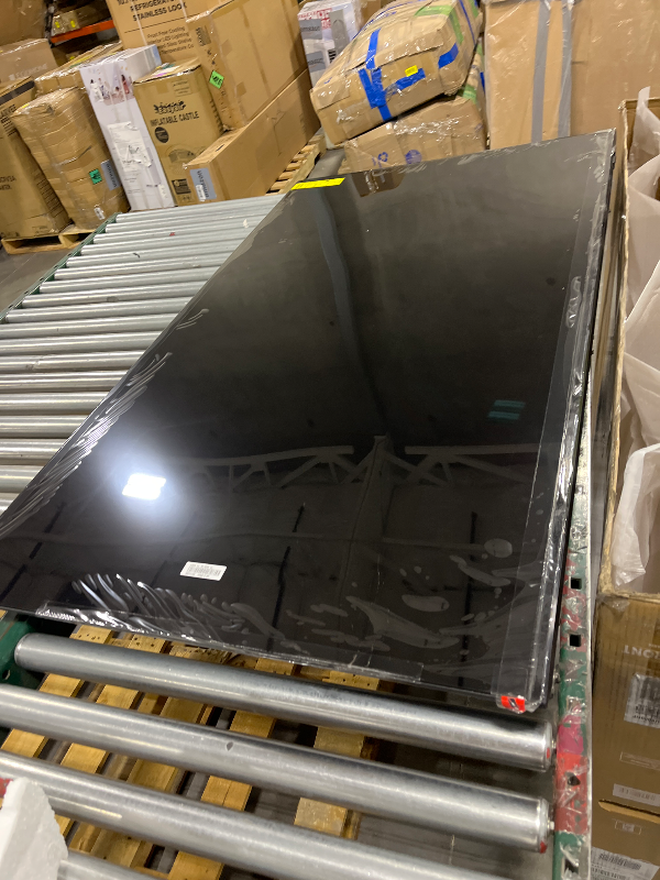 Photo 1 of Samsung 65-Inch Class U8000H Series Crystal UHD, 4K, Smart TV, 2026 Model-------TV SCREEN IS CRACKED SELL FOR PARTS ONLY