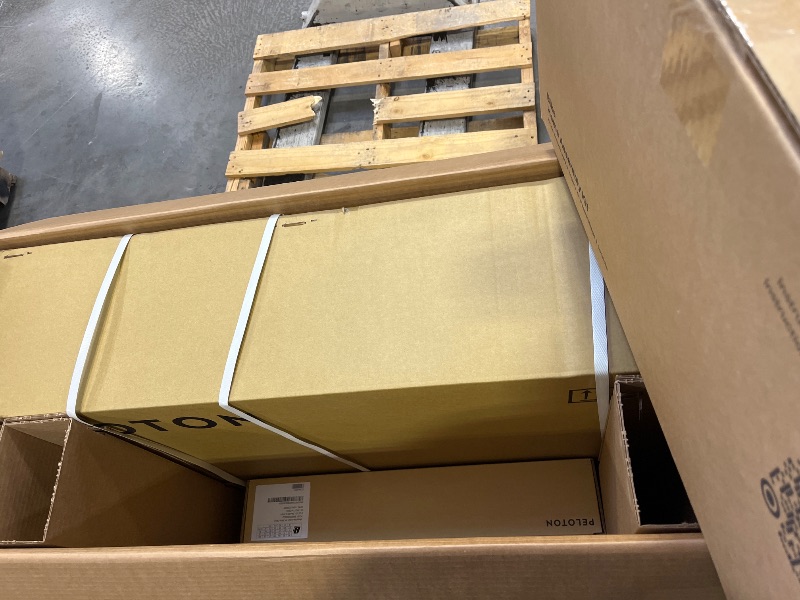Photo 1 of Peloton Exercise Bike, Indoor Stationery Cross Training Bike for Home------ITEM IS FACTORY SEALED OPENED ALITTLE FOR PICTURE