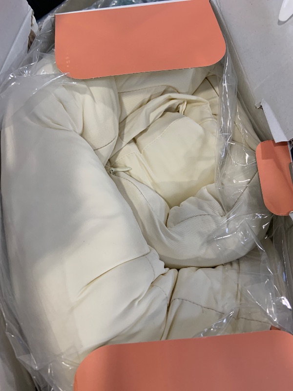 Photo 1 of Frida Mom Compact Support 4-in-1 Pregnancy Pillow, Cooling Pregnancy Pillow, Twist & Bends into 4 Shapes for Comfort & Full Body Support, Compact Storage, Easy to Clean, Breathable, Storage Bag, Ivory