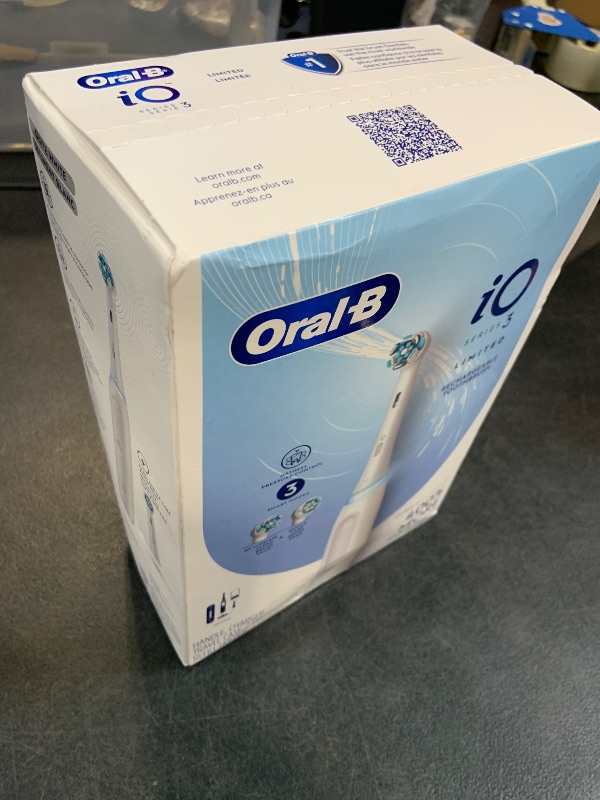 Photo 1 of Oral-B Rechargeable Electric Toothbrush, iO3 Limited Deep Clean, 3 Cleaning Modes, Visual Pressure Sensor to Protect Gums, 2 Brush Heads, Travel Case, White