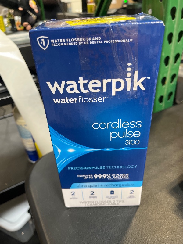 Photo 1 of Waterpik Cordless Pulse 3100 Rechargeable Portable Water Flosser for Teeth, Gums, Braces Care and Travel with 2 Flossing Tips, Waterproof for Shower Use, ADA Accepted, WF-20 Blue, Amazon Exclusive