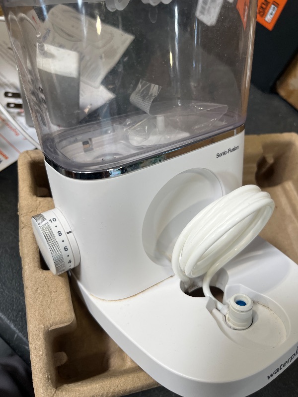 Photo 1 of Waterpik Sonic-Fusion 2.0 Professional Flossing Electric Toothbrush with Water Flosser Combo Two In One, For Daily Gum Care and Cleaning Teeth, Braces, Implants, White SF-04CD010-1, Packaging May Vary