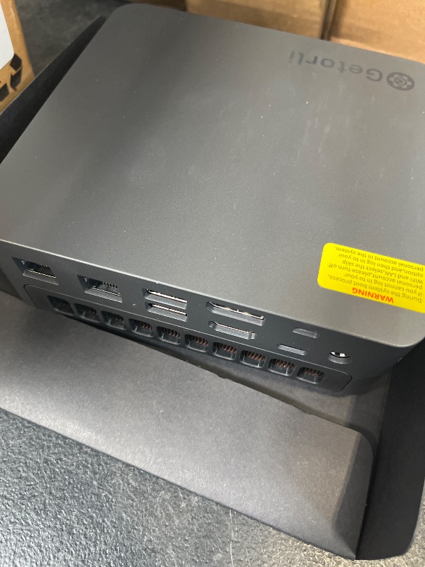 Photo 1 of Getorli AI Mini PC AMD Ryzen 7 Pro 8845HS CPU Radeon 780M Graphics Compact Gaming PC 32GB DDR5 RAM 1TB SSD Small Desktop Computer Dual 2.5GLAN 4K HDMI DP Micro PCs WiFi 6 BT5.3 Prebuilt OS Office Home